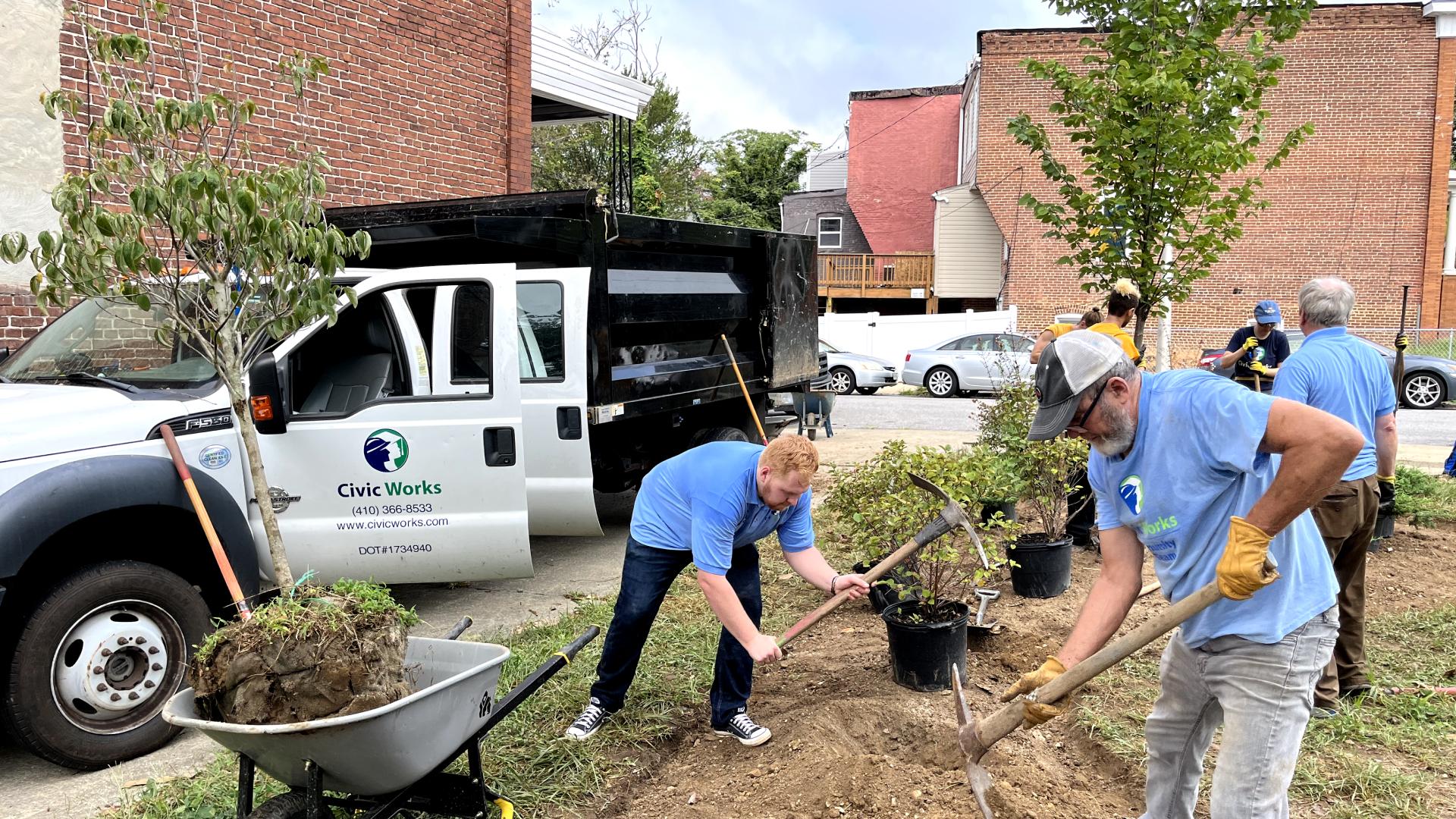 Landscape team working in a city lot